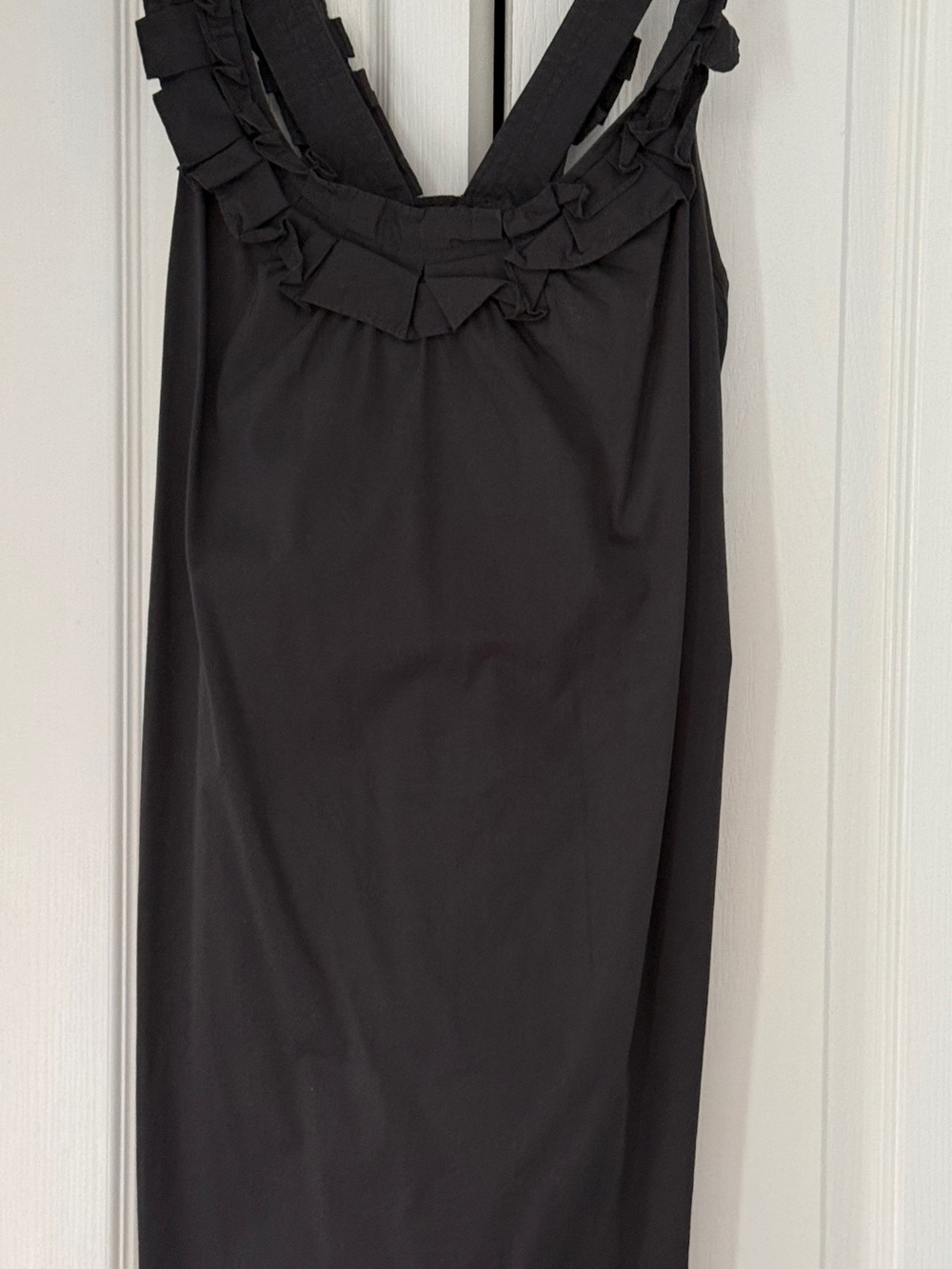Tasteful Black Mini Dress with Ruffle-Trim